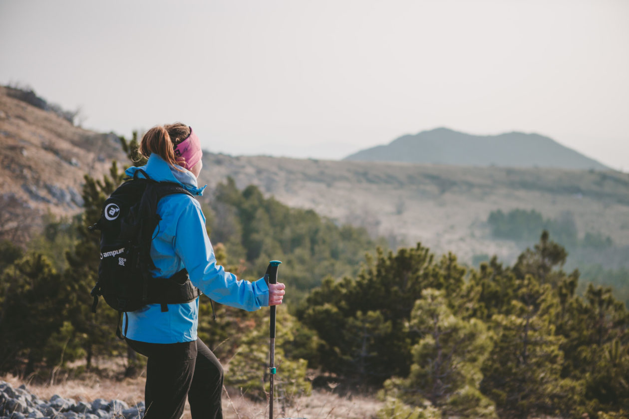 girl in hiking equipment in nature